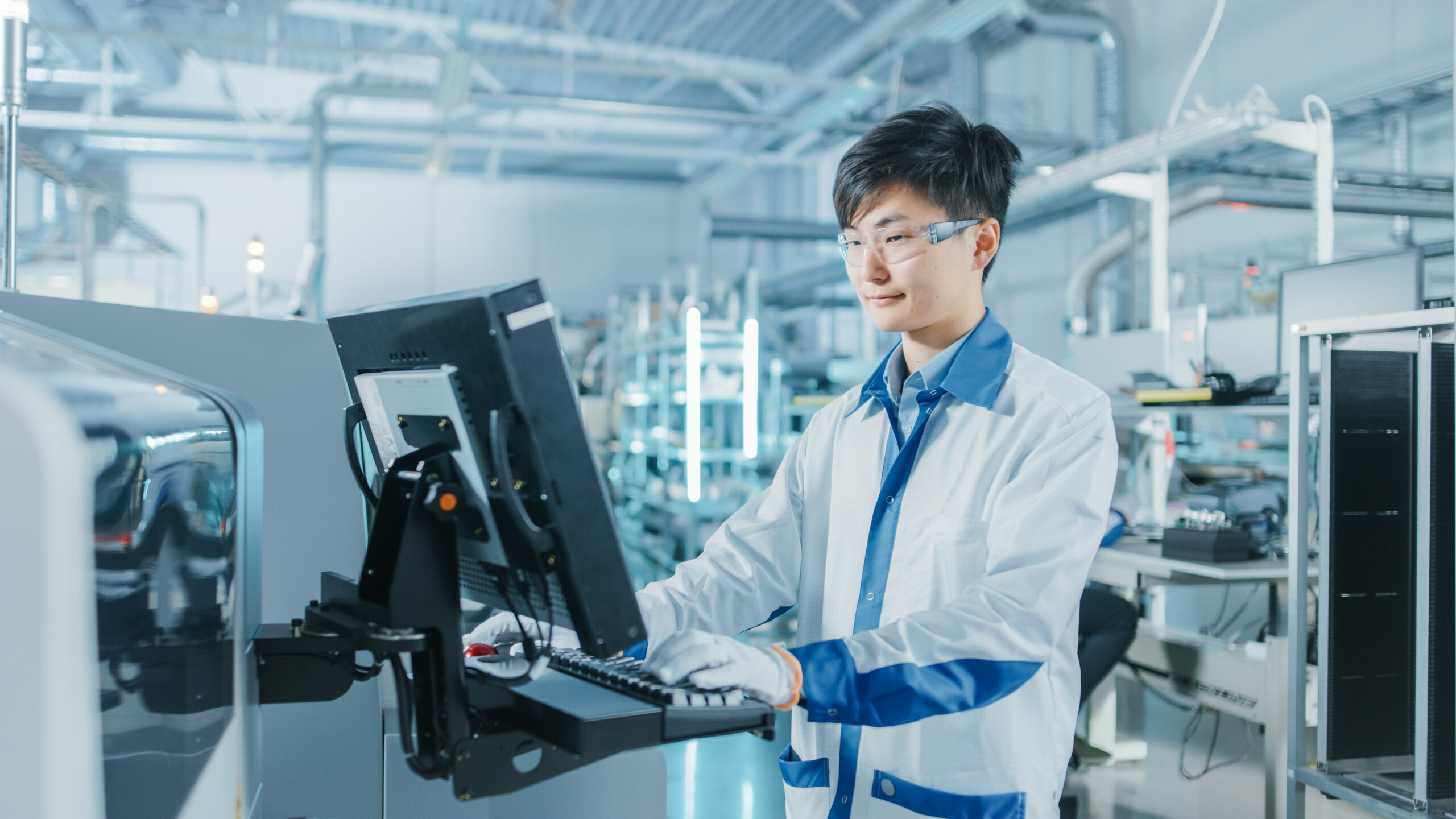 High-tech factory engineer at work, representing the need for local contract protection in SLA-based IT support in Vietnam