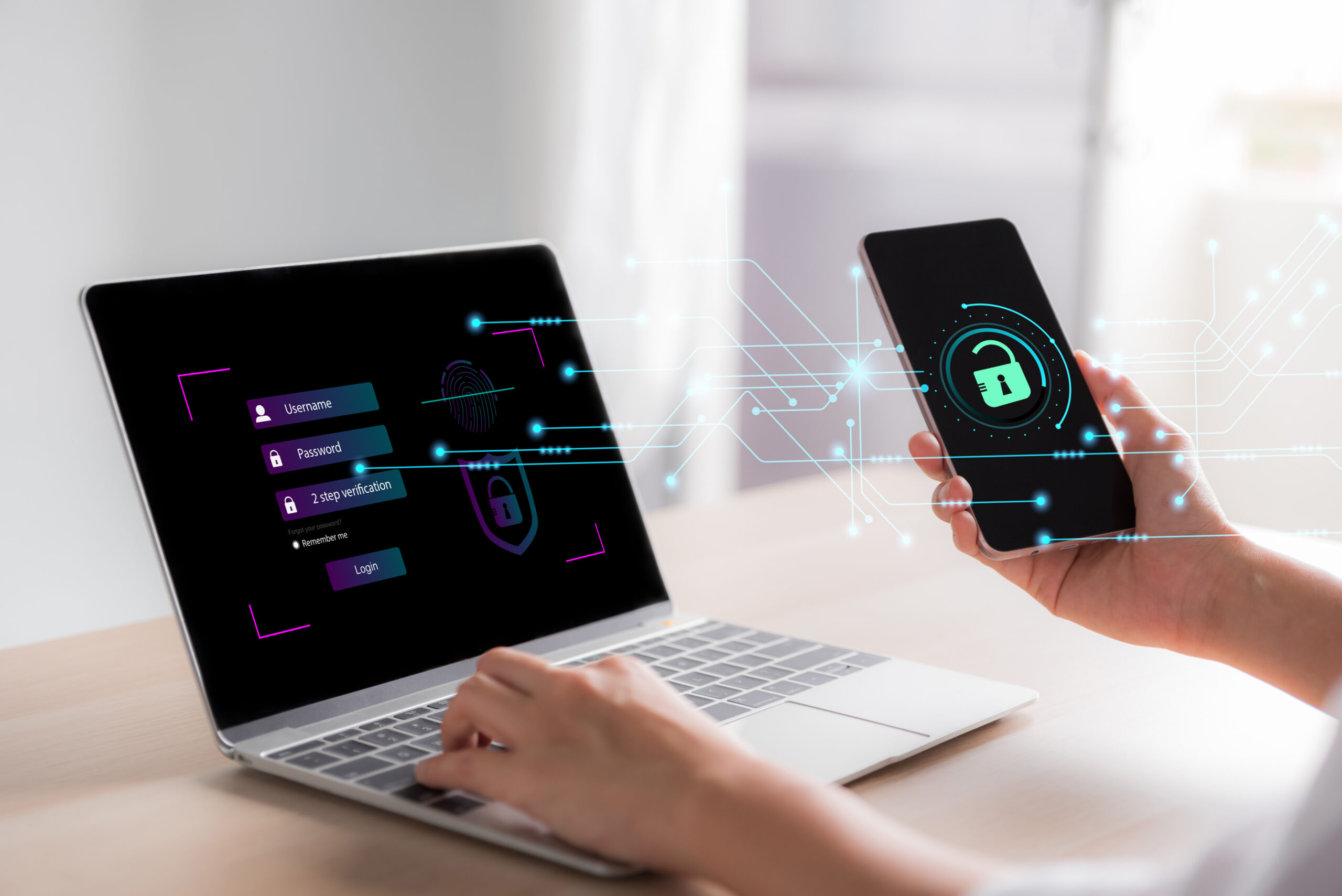 Laptop and smartphone showing digital security icons, illustrating data protection and cybersecurity compliance